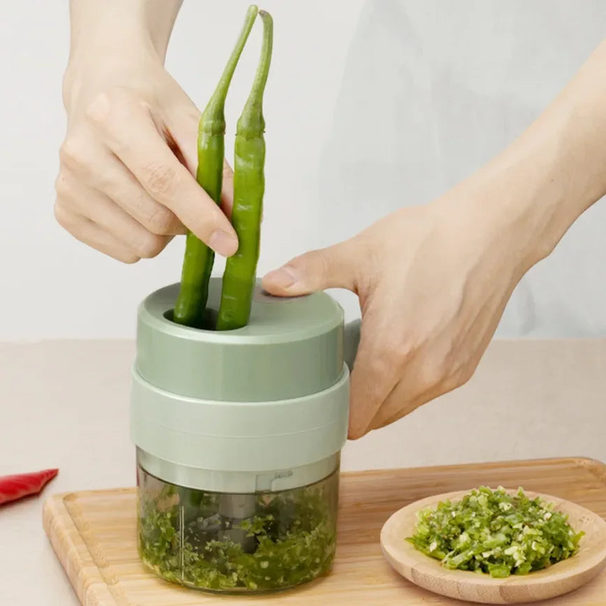 SwiftChop™ 4-in-1 Handheld Electric Veggie Slicer